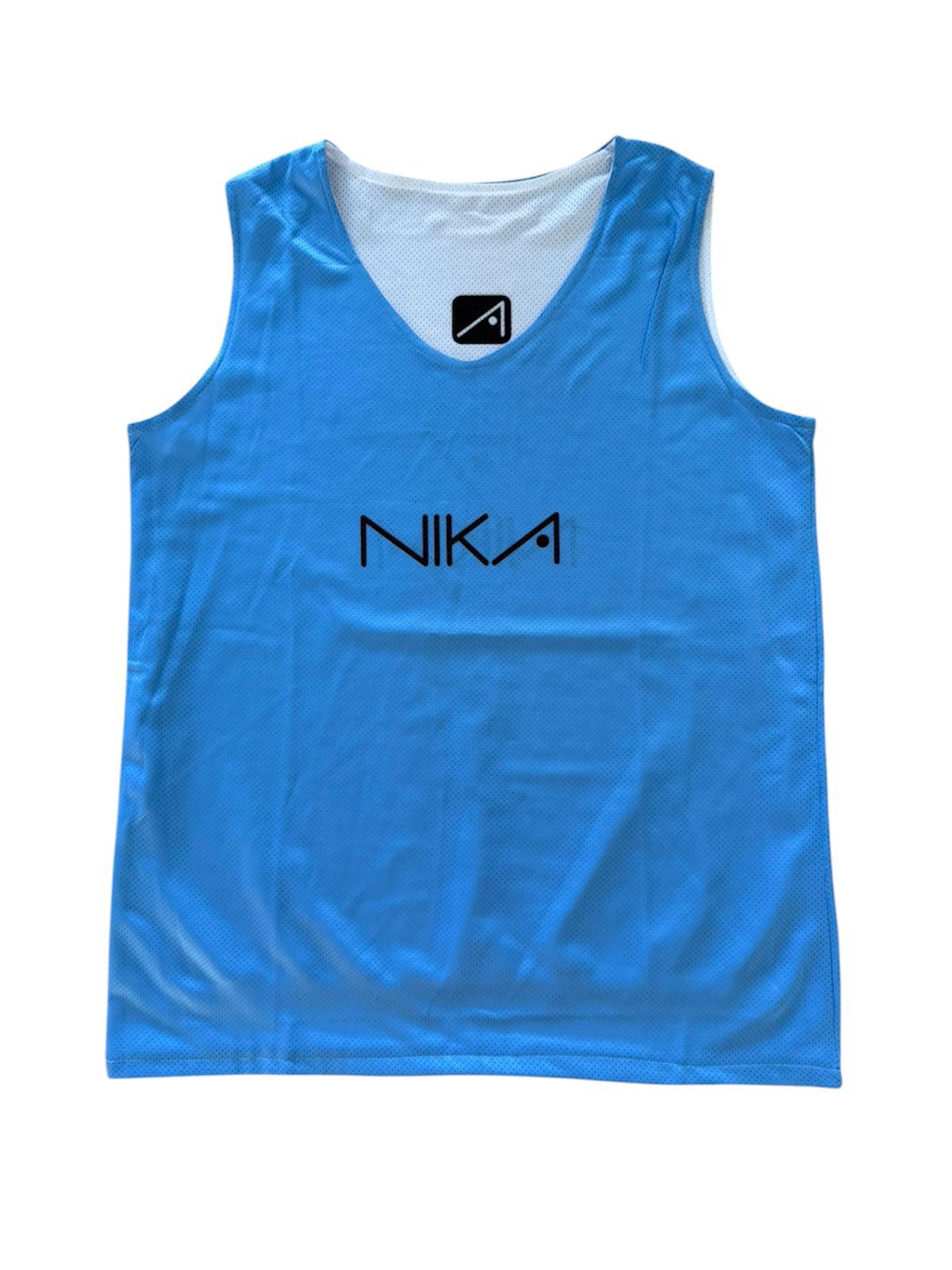 Reversible Nika T-shirt in two colors.